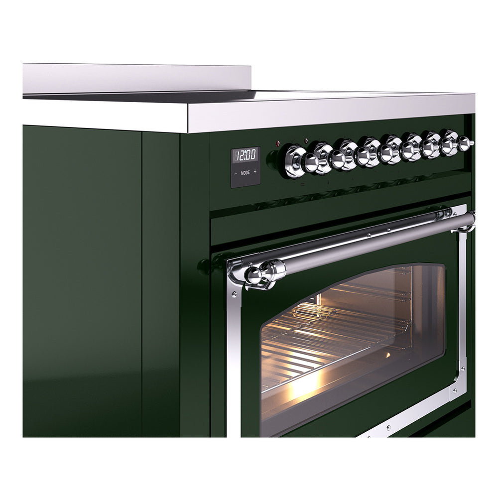 Emerald green induction range close-up: chrome control knobs, door handle and oven window