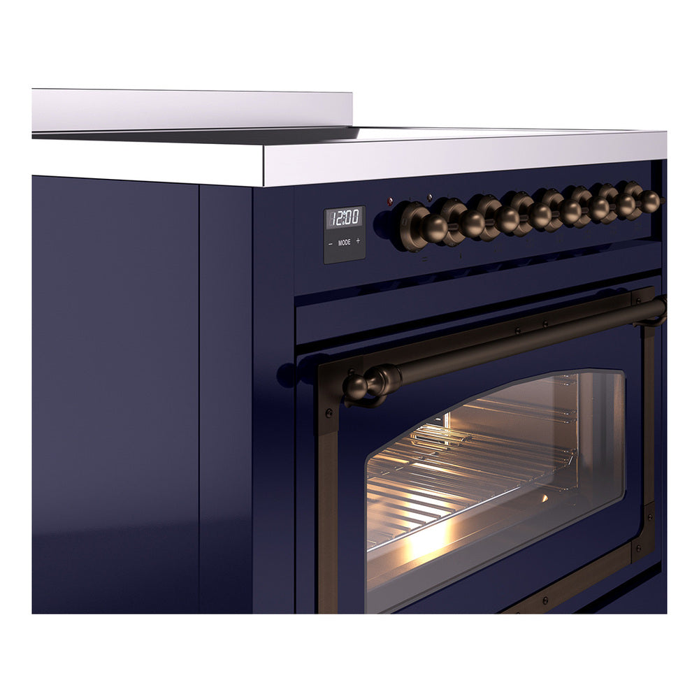 Midnight blue induction range with bronze knobs and open oven door window