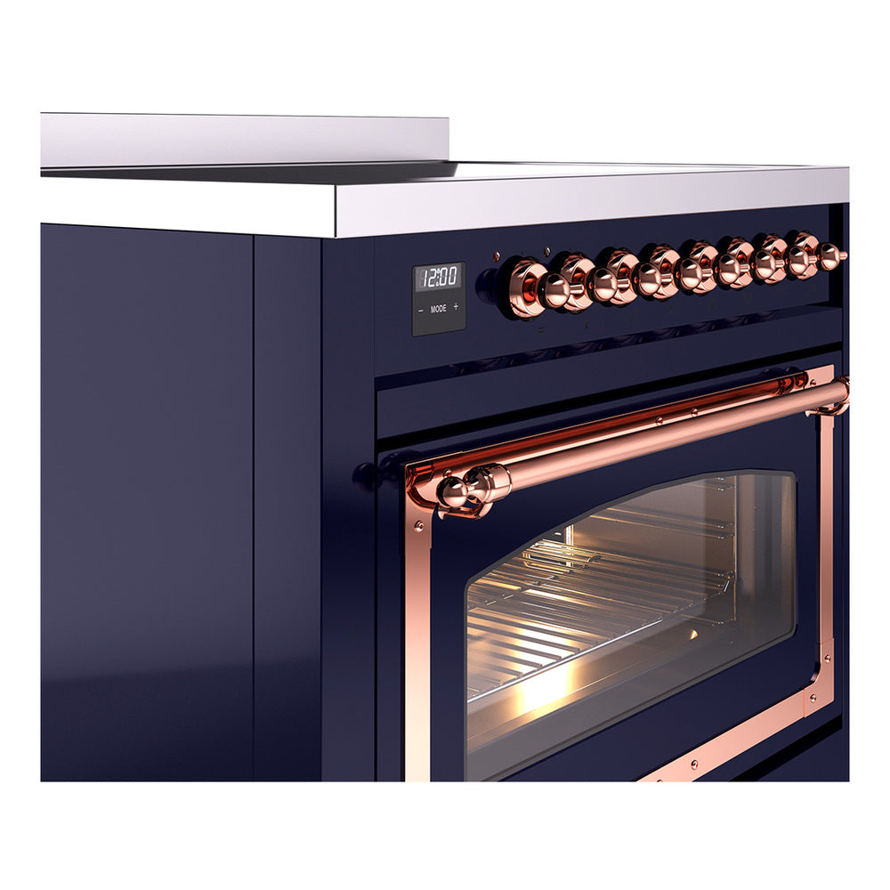 Midnight blue range controls with copper knobs and copper-trimmed oven handle, close view