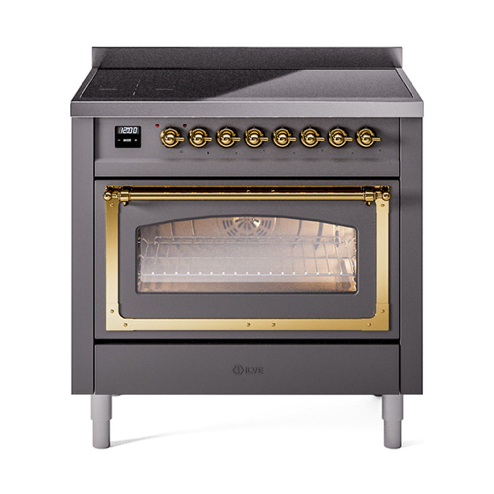 Matte graphite induction range with brass handle and oven window