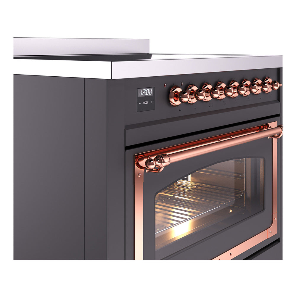 Graphite induction range with copper control knobs and open oven door