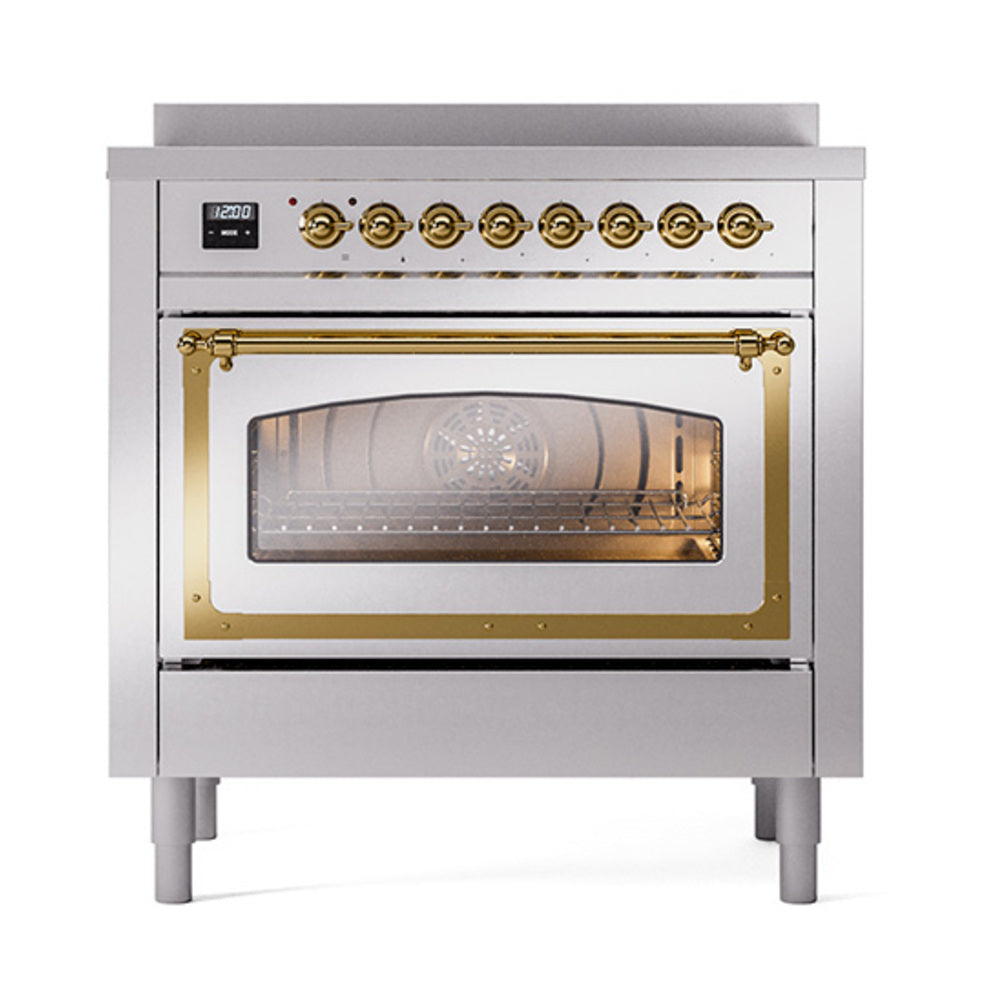 Stainless induction range with glass oven door and brass trim, front view