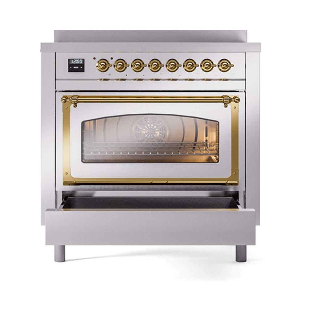 Stainless induction range with triple glass door and brass trim, front view