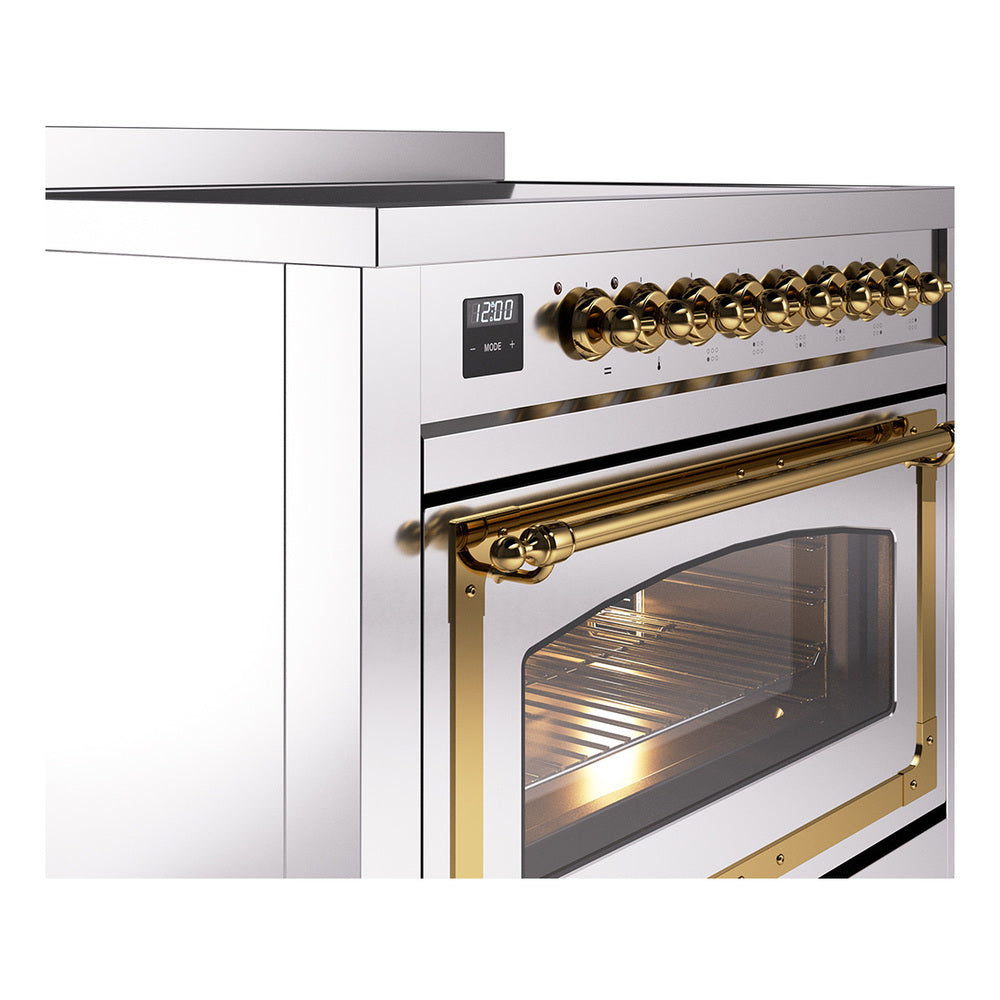 Stainless induction range with brass control knobs and open oven door
