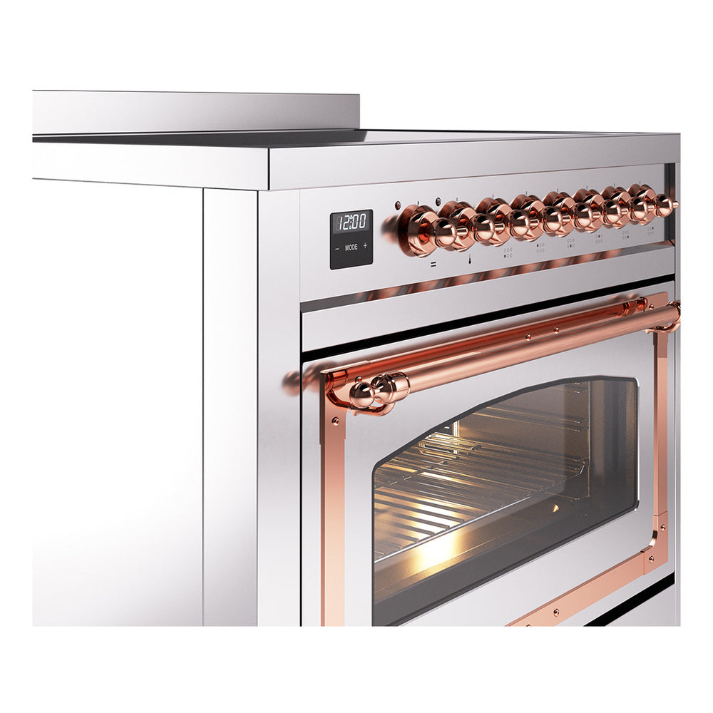 Stainless steel induction range control panel with copper knobs and oven door frame