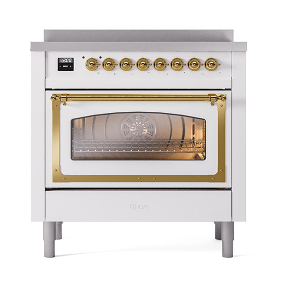 ILVE white induction range with oven door open, brass frame, gold control knobs