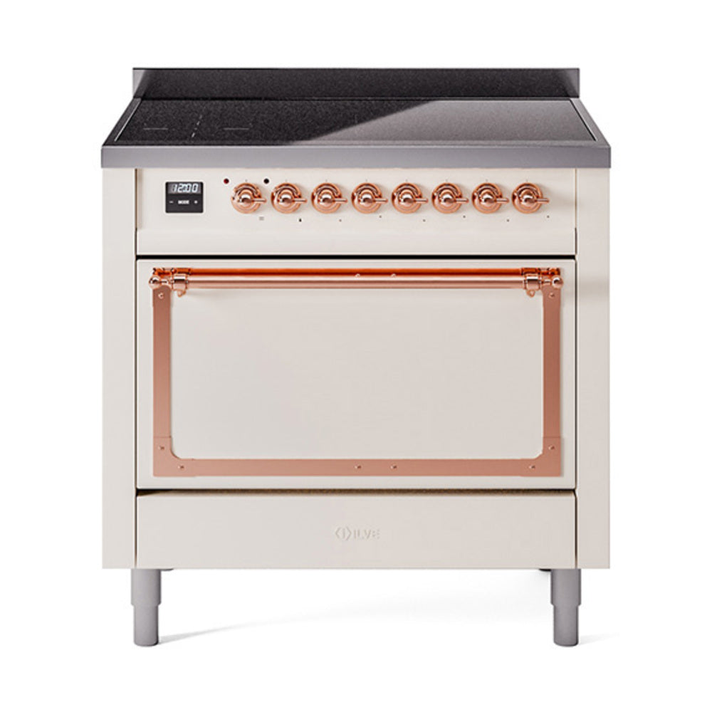 Antique white ILVE induction range with closed oven door and copper handle trim