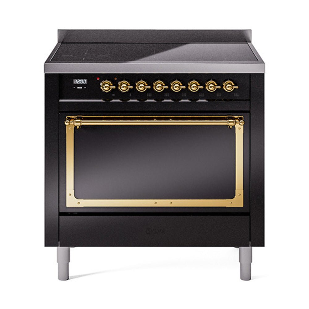 36-inch induction range with glossy black oven door and brass trim, front view