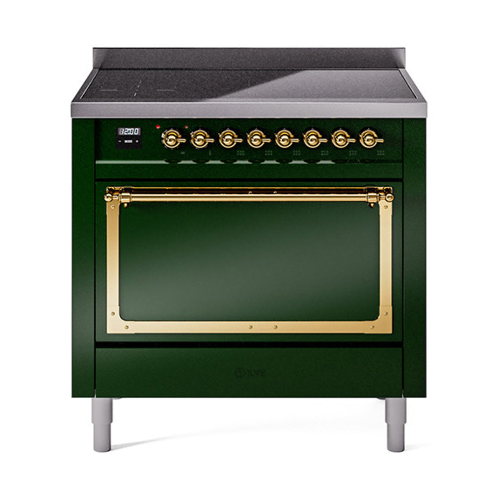 Emerald green induction range with brass oven door frame and black cooktop