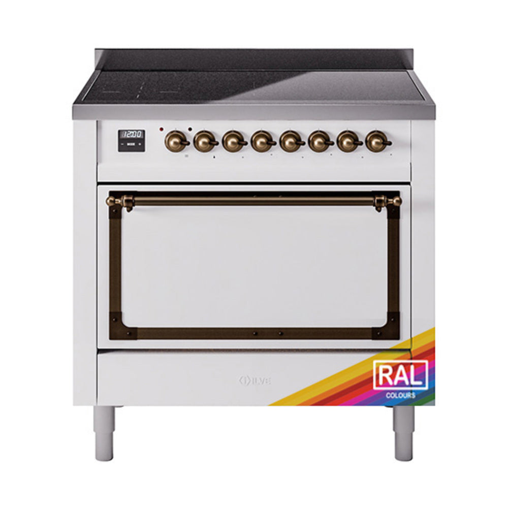 White induction range with bronze-trimmed door and brass control knobs
