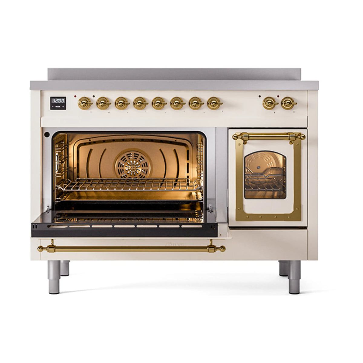 Antique white induction range with brass trim, open main oven and side oven door.