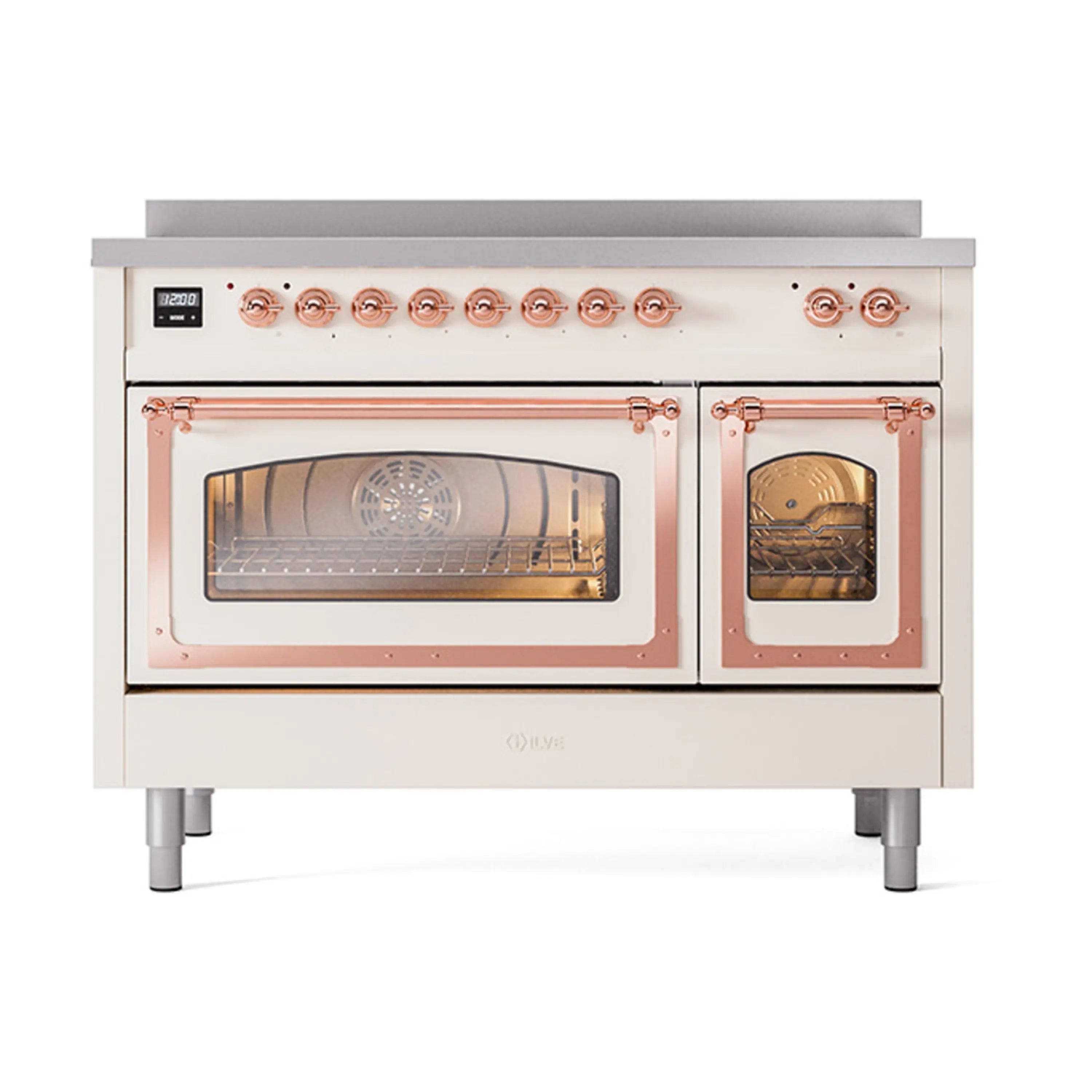 Antique white induction range with copper trim, triple glass oven doors, control knobs