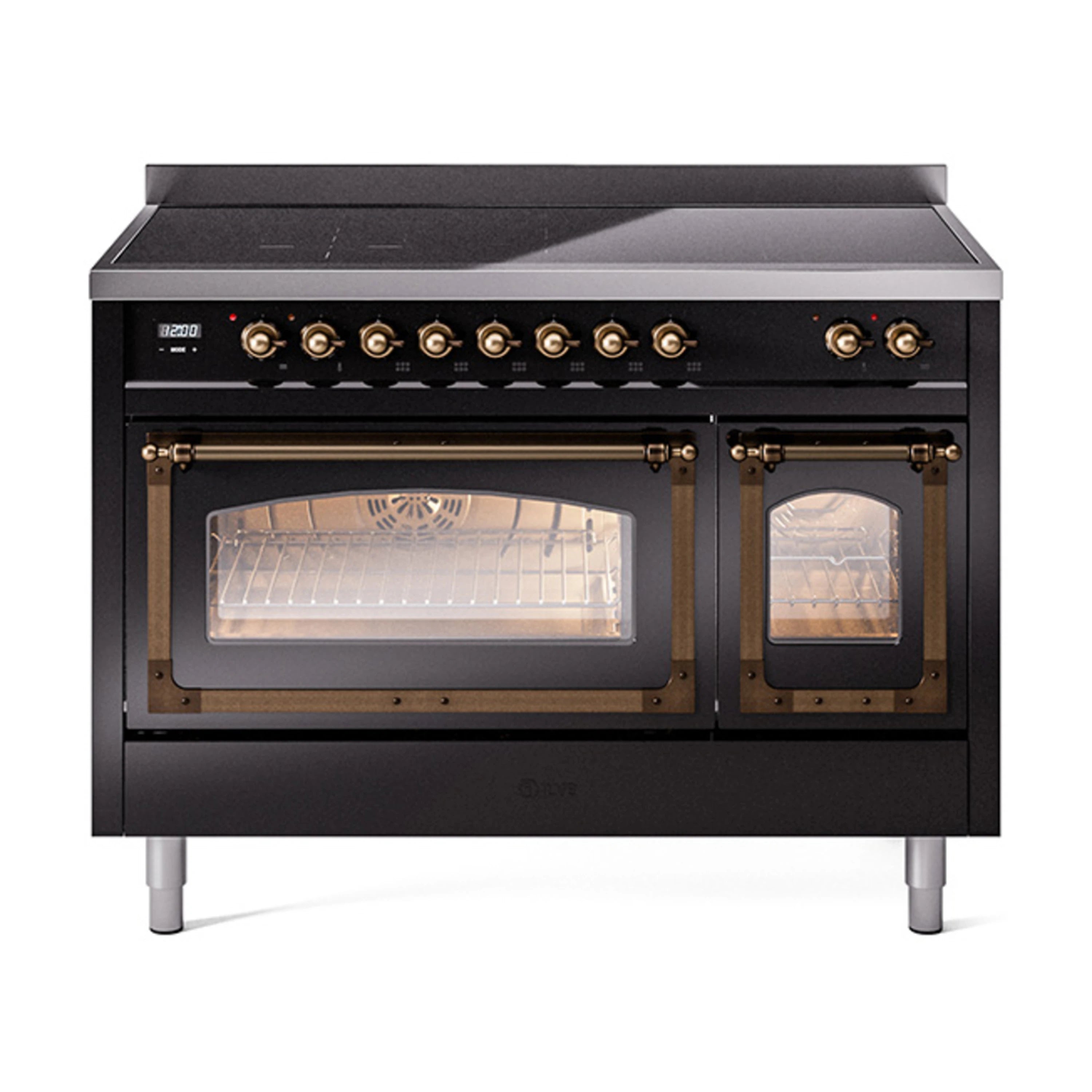 Glossy black induction range with illuminated oven interior and triple glass doors, open.