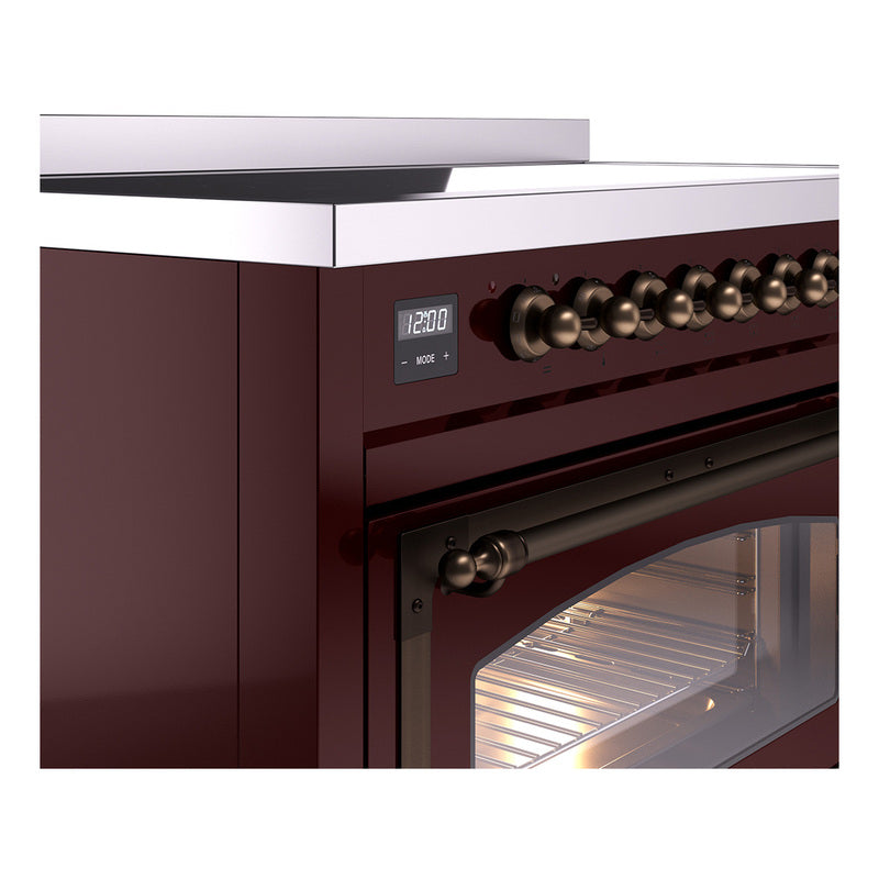 Burgundy induction range with bronze trim, triple glass doors and control panel