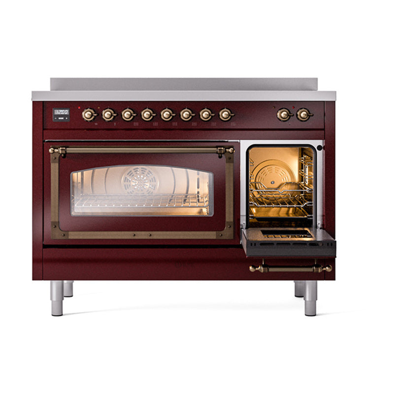 Burgundy induction range with illuminated oven cavity and open right glass door