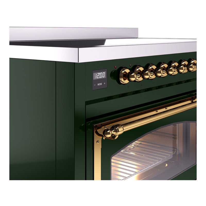 Emerald green induction range control panel with brass knobs and oven door handle