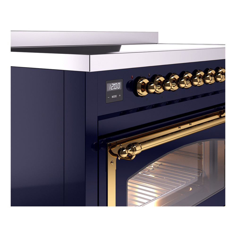 Midnight blue induction range control knobs with digital display and brass accents