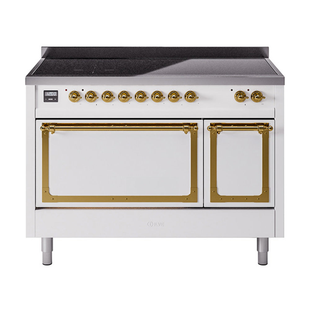 White induction range with black cooktop and two brass-trimmed oven doors