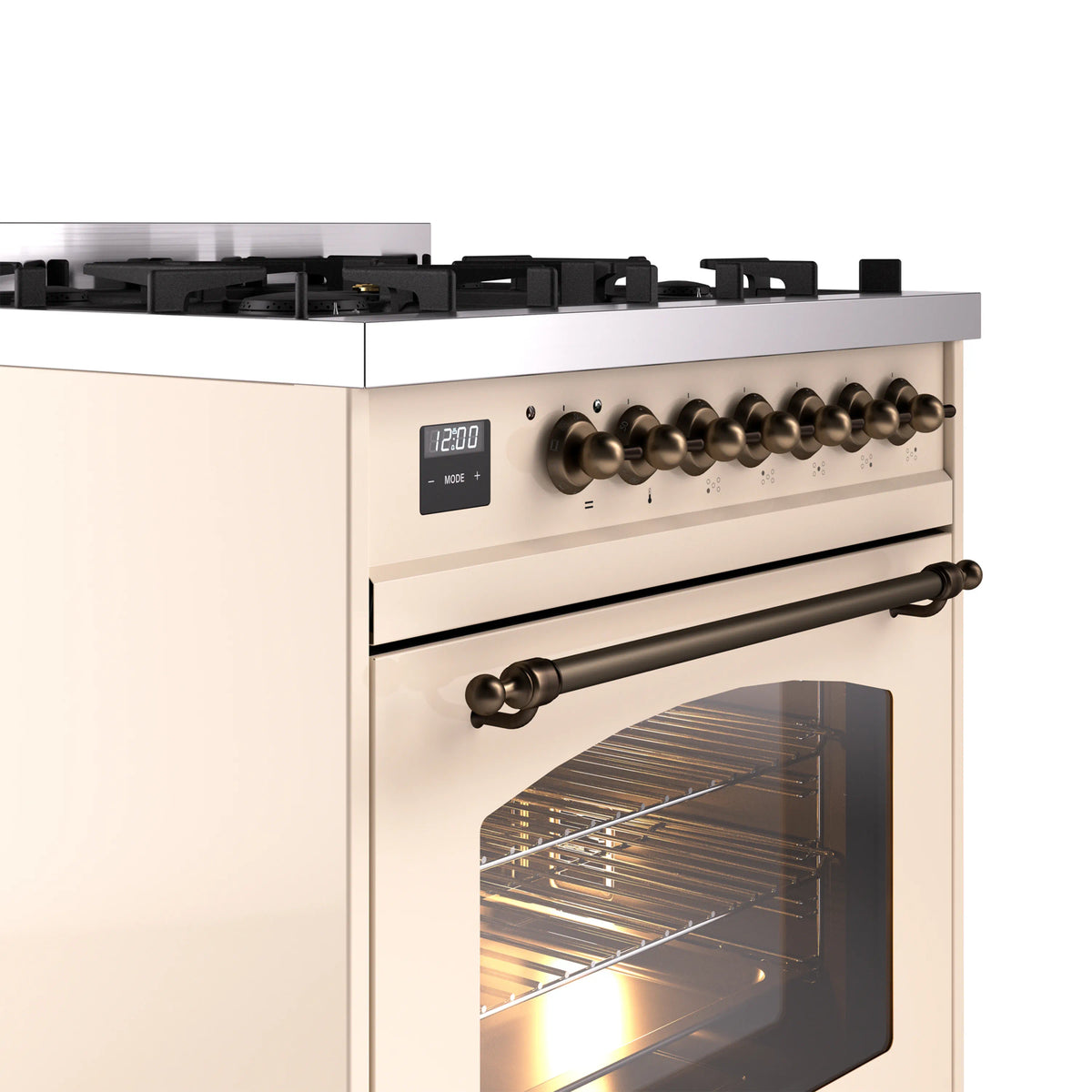 Freestanding dual fuel range front corner with bronze control knobs and lit oven window