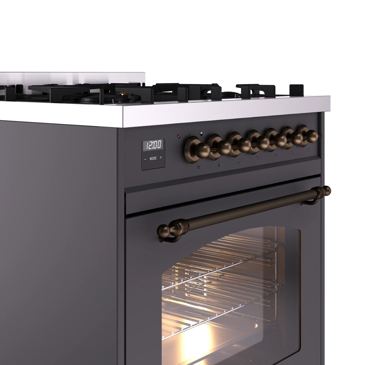 Matte graphite range with bronze control knobs, digital display, and lit oven window
