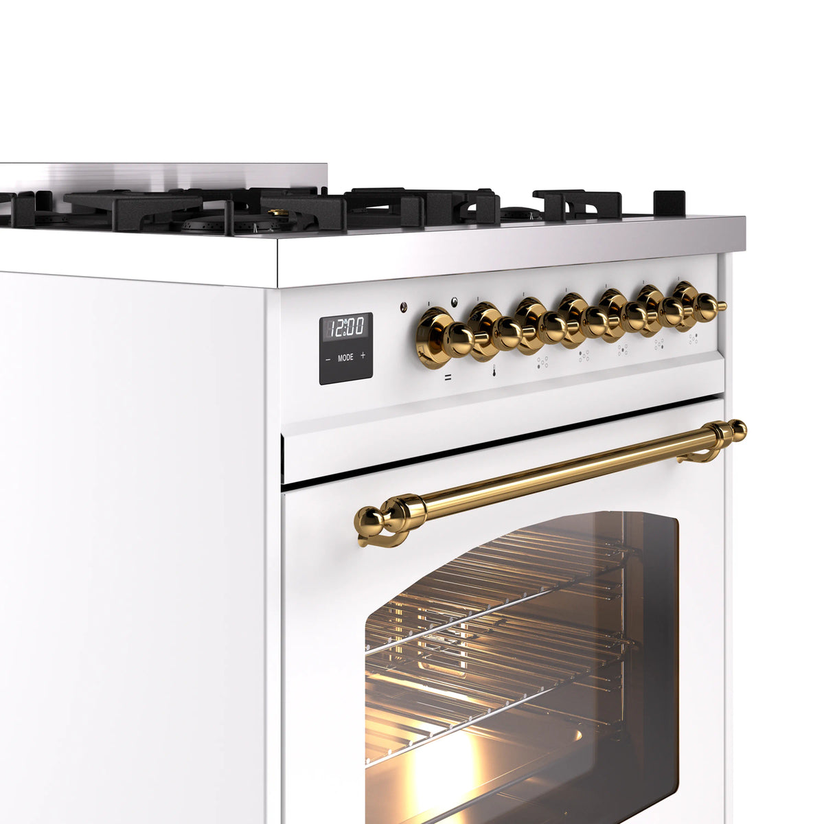White freestanding range with brass control knobs, long brass handle, and oven window