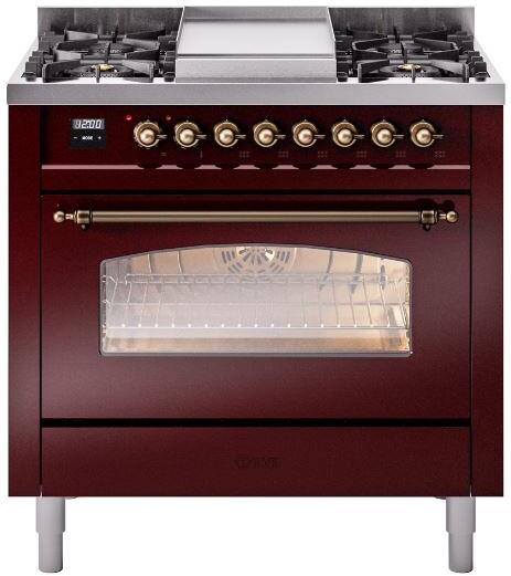 Burgundy dual fuel range with four burners, bronze knobs, and glass oven window