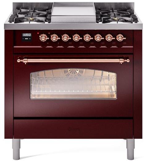 Burgundy dual fuel range front with four burners, copper knobs, and oven glass window