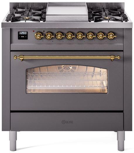 Freestanding dual fuel range with cooktop burners, brass knobs, and oven door window
