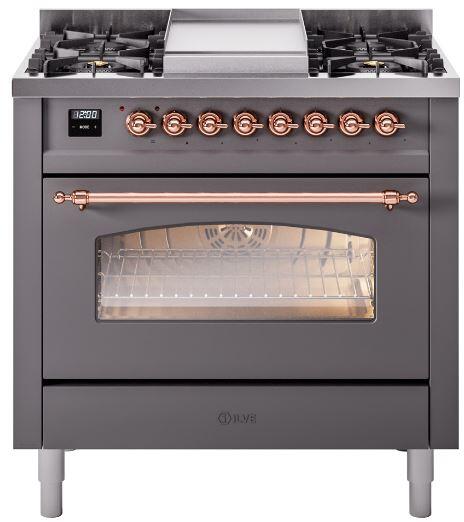 Freestanding dual fuel range front with cooktop burners and copper control knobs