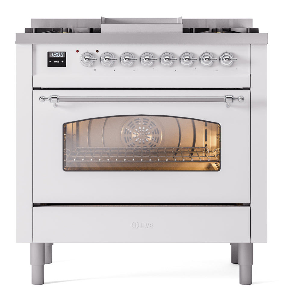 Freestanding dual fuel range with oven door open and illuminated interior
