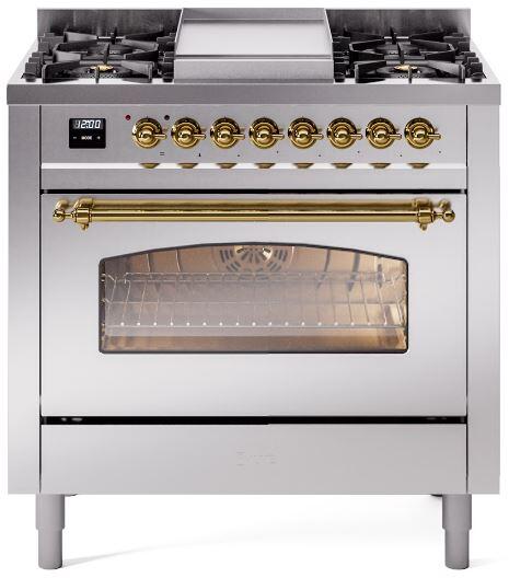 Stainless dual fuel range front with oven window and brass control knobs