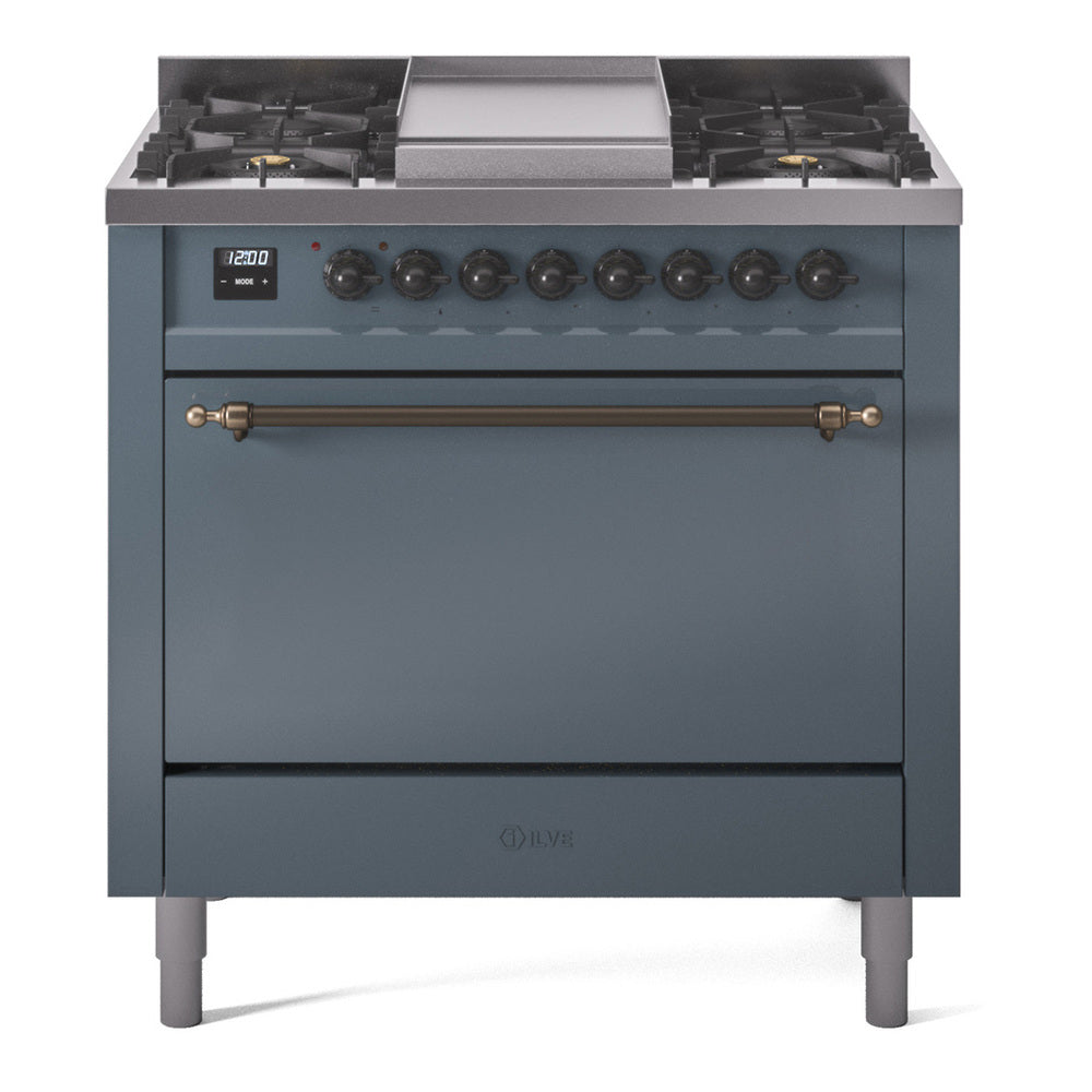 Blue grey range front with 6 knobs, brass handle oven door, and cooktop burners