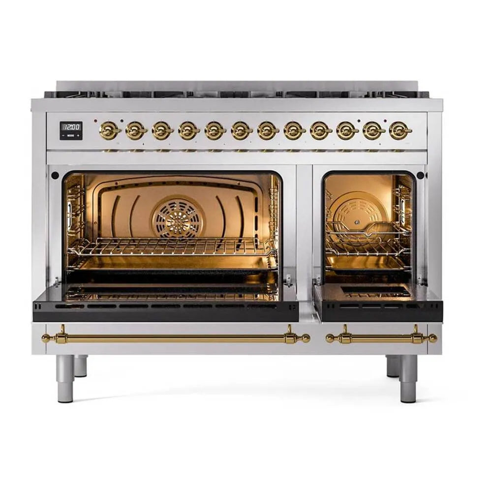 Dual fuel range with both oven doors open, warm interior racks, and brass trim