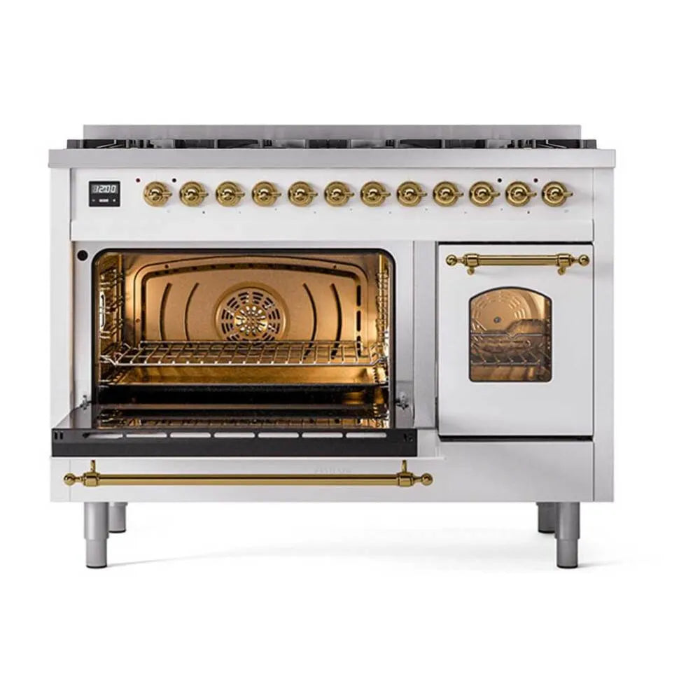 White dual fuel range with open ovens, brass trim, and glass oven viewing windows