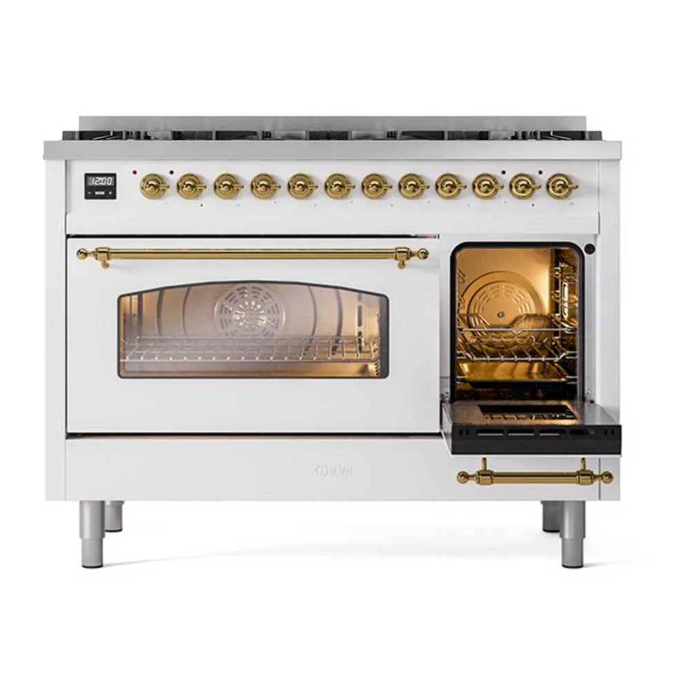 White dual fuel range with brass knobs, left oven window, and open right oven door