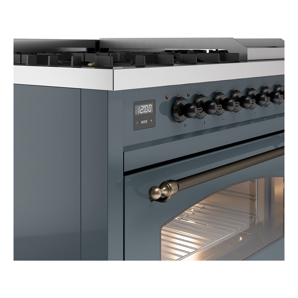 Blue grey dual-fuel range corner view with bronze oven handle and lit lower oven rack