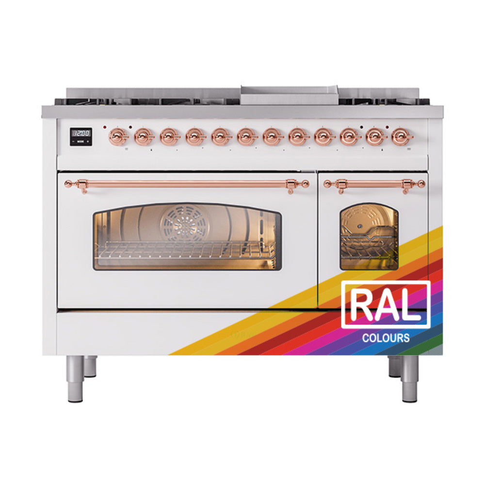 Dual fuel freestanding range front in white with copper knobs and oven window