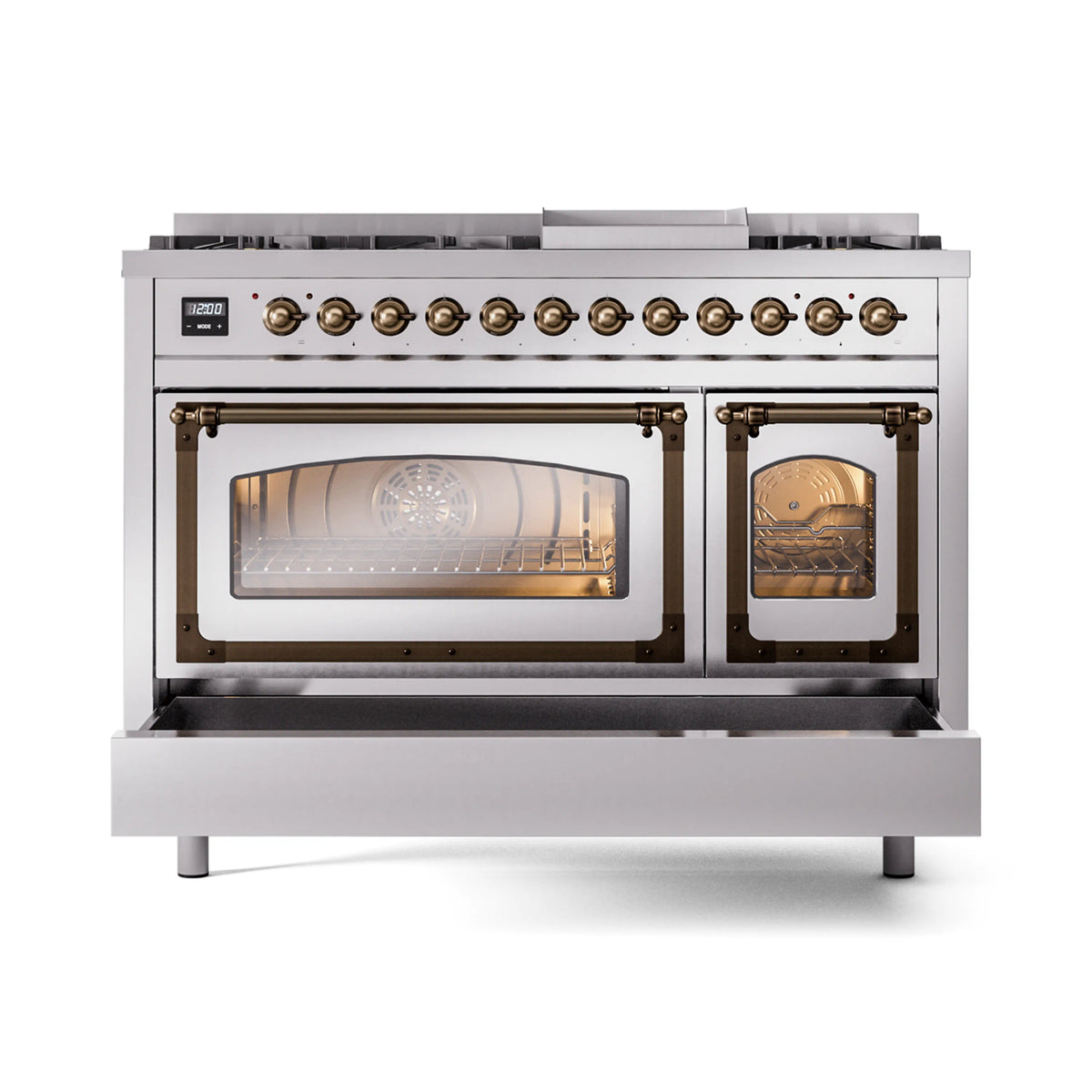 Stainless steel dual fuel range front with bronze knobs and lit ovens behind glass