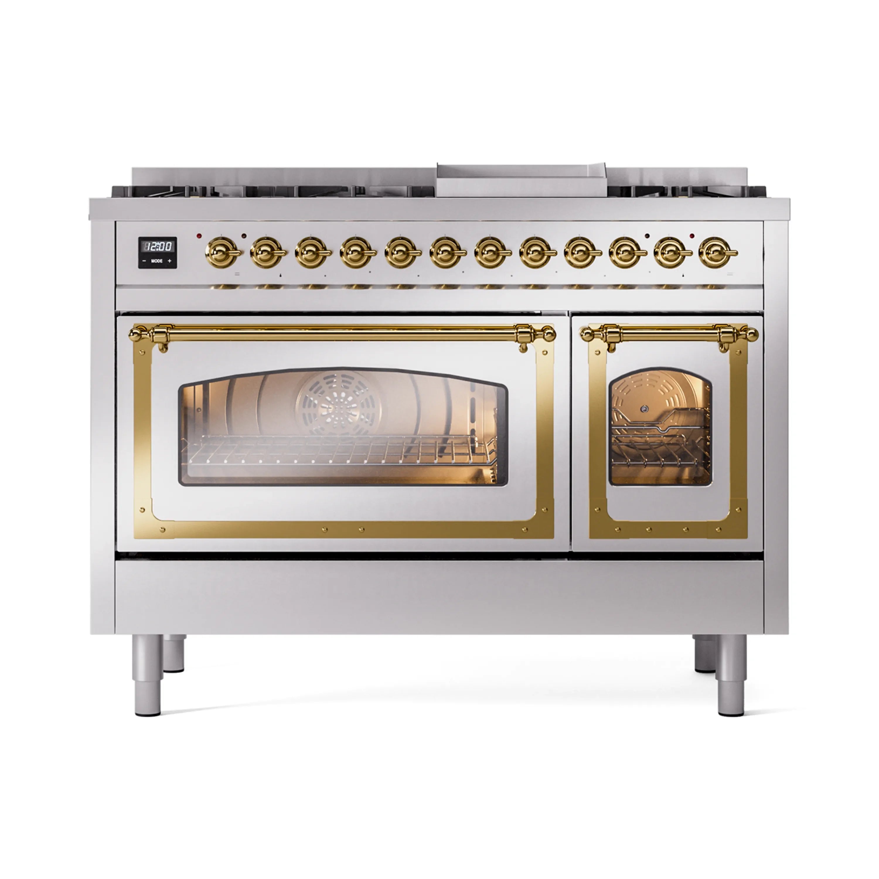 Freestanding stainless steel dual fuel range with brass trim, two oven doors, and knob row