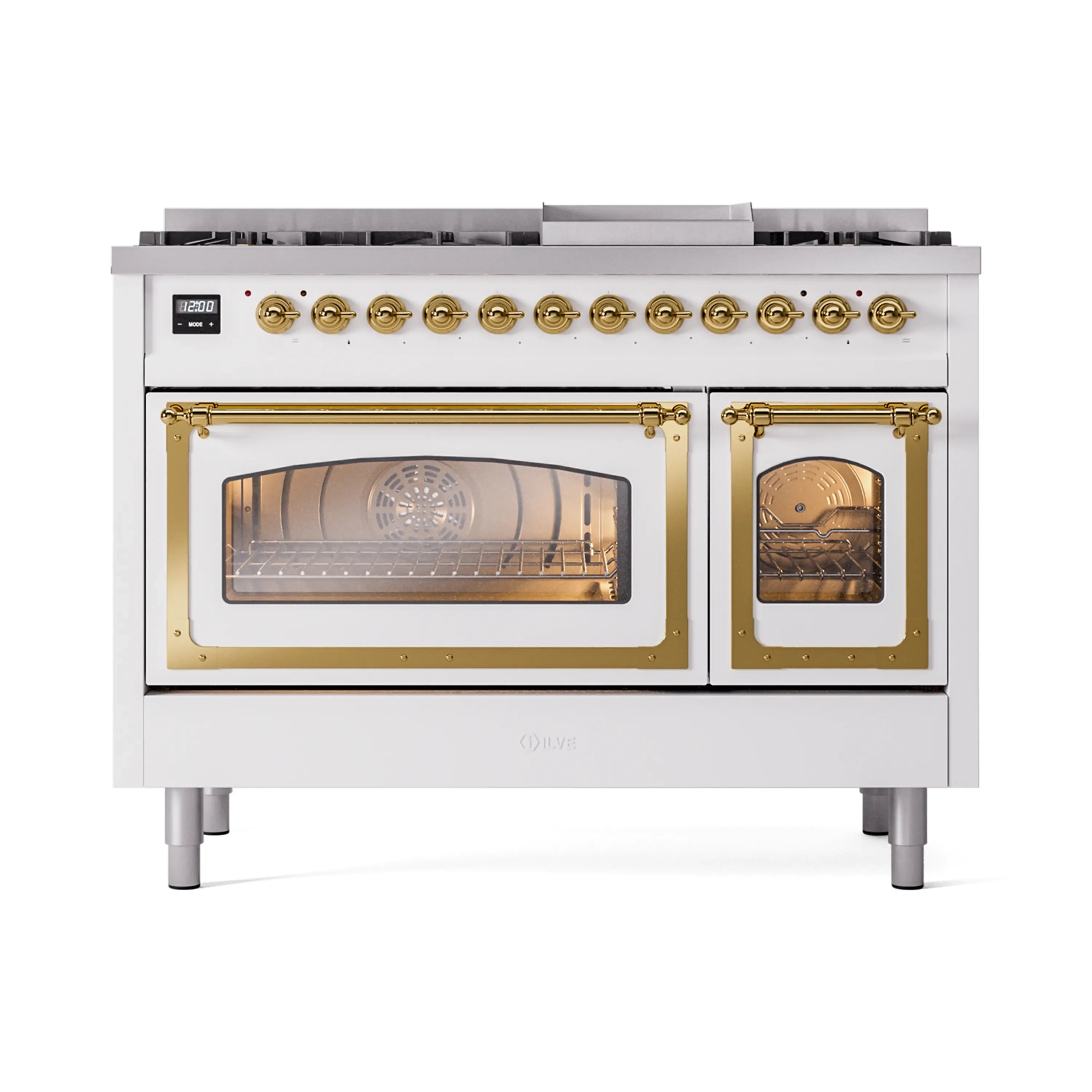 Freestanding dual-fuel range in white with brass knobs and visible oven windows