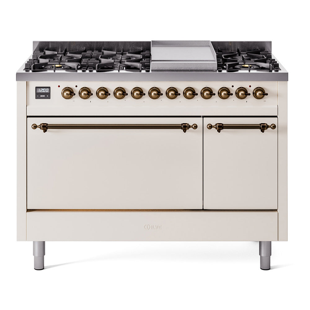 Antique white gas range with bronze knobs, griddle on top, dual ovens