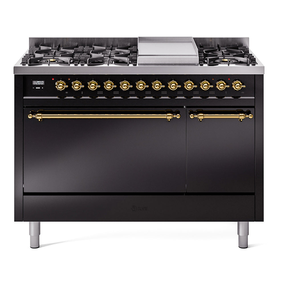 Black dual fuel range with brass knobs, griddle on top, and two oven doors