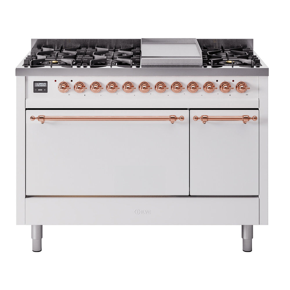 White dual-fuel range with black griddle, copper control knobs, and double oven doors
