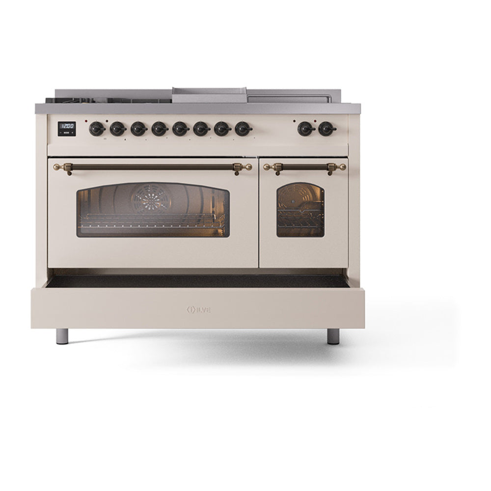 Antique white dual fuel range with bronze knobs, dual oven doors, and windowed glass