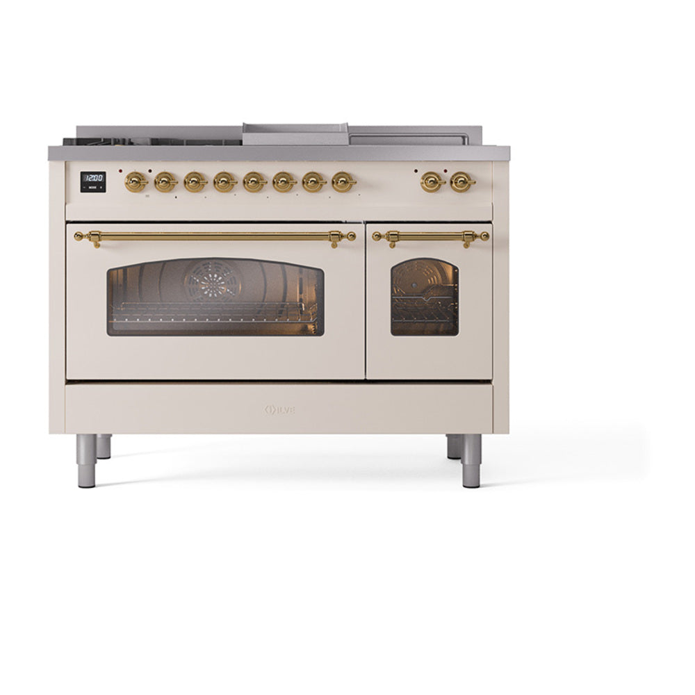 Antique white dual fuel range with brass-trim burners and two glass-front ovens