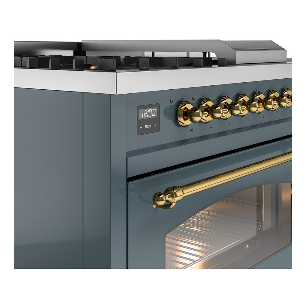 Blue-grey range with brass control knobs, oven door handle, and open oven window