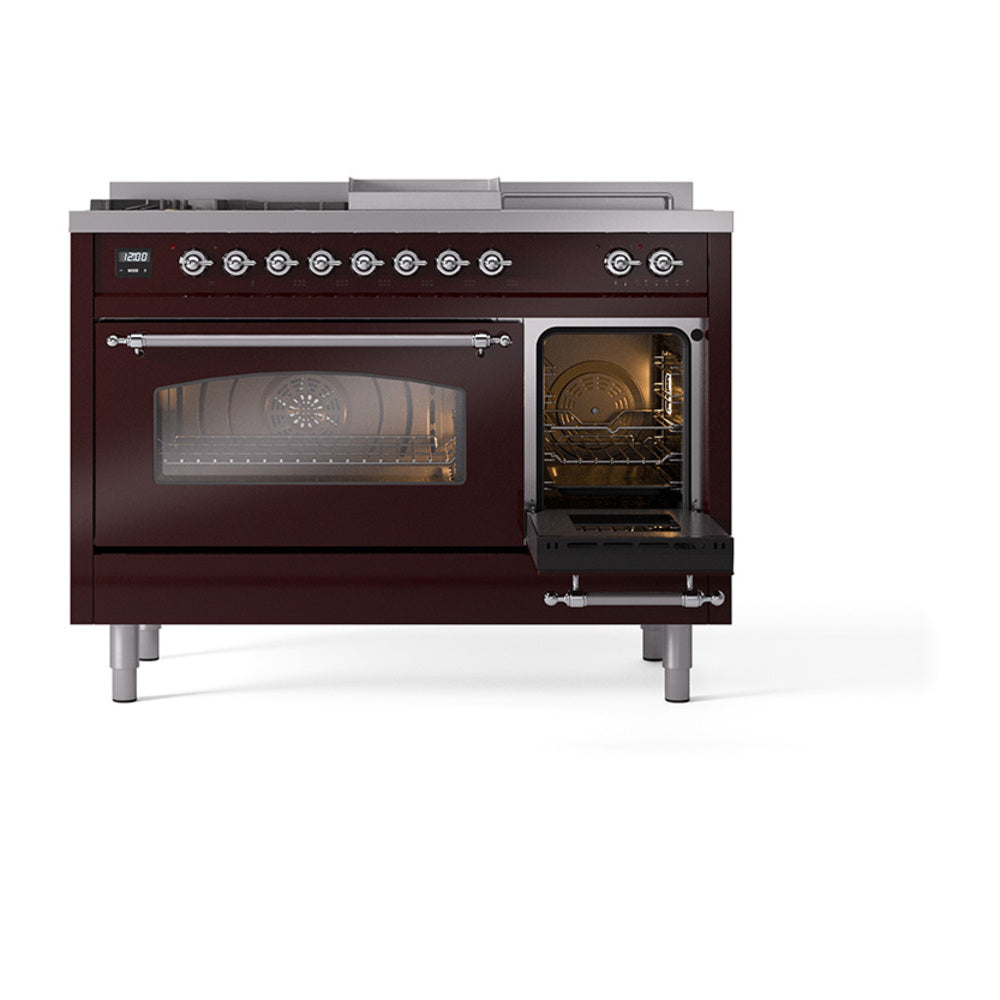 Dual fuel range with one oven and storage drawer open; chrome handles and racks visible.