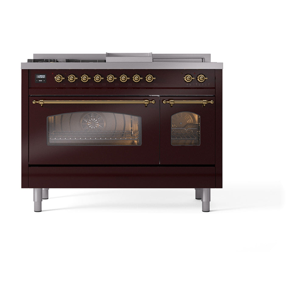 Burgundy freestanding range with brass knobs and two oven doors with triple glass windows