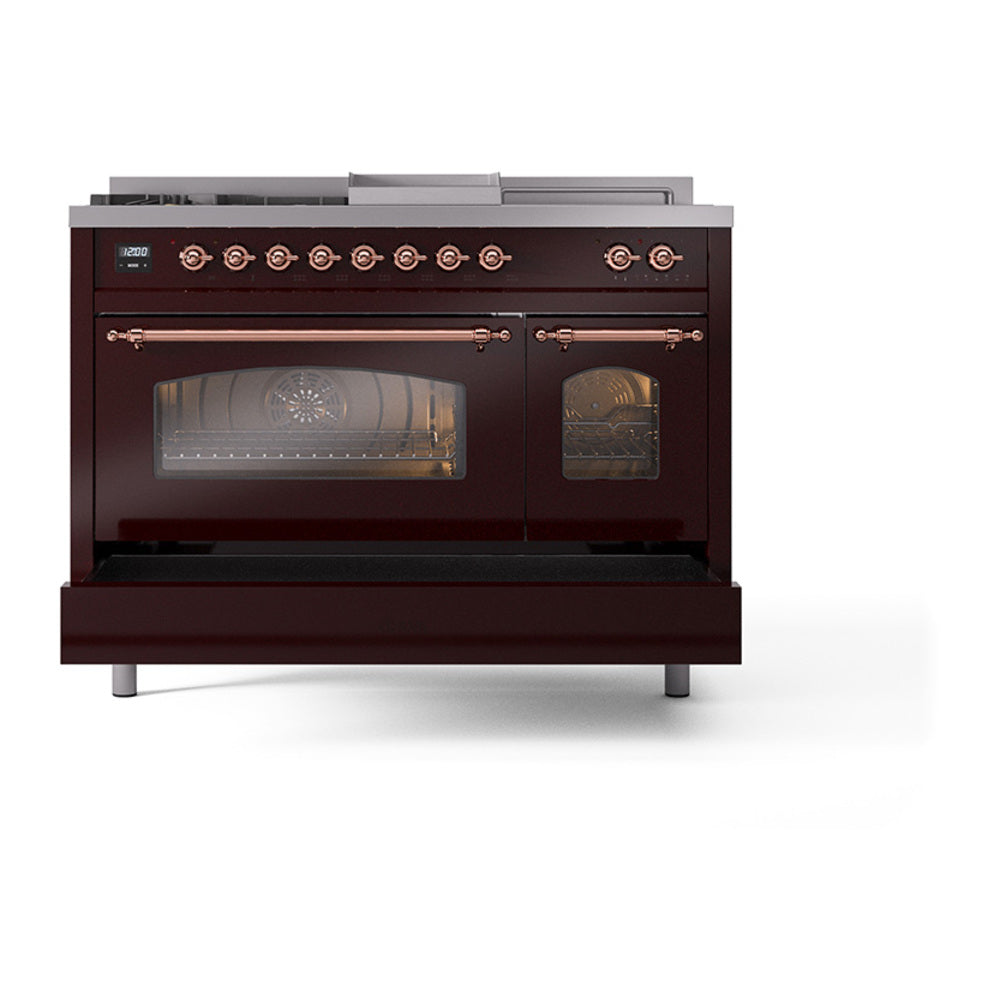 Burgundy dual-fuel range with two glass-front oven doors and copper bar handles