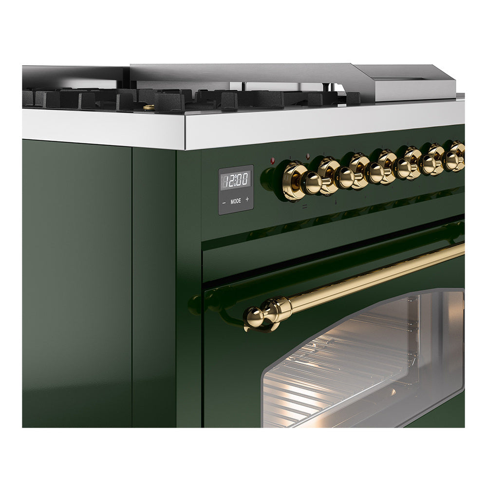 Emerald green range control panel with brass knobs and oven door window